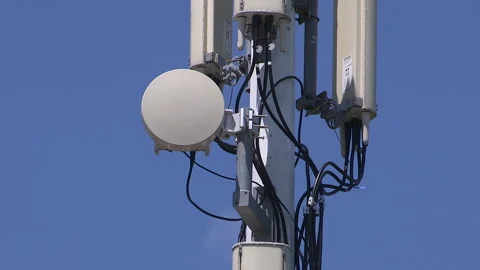 Toronto, On, Aug 1 2026 Cell tower with multiple antennas on it in the city Stock Footage 341027523