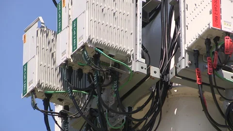 Toronto, On, Aug 1 2026 Cell tower with multiple antennas on it in the city Stock Footage 341027553
