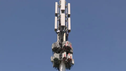 Toronto, On, Aug 1 2026 Cell tower with multiple antennas on it in the city Stock Footage 341027554
