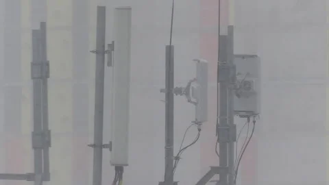Toronto, Ca, March 31 2025 Winter blizzard, snow blocks cell tower signal Stock Footage 327988175