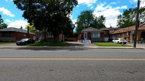 Toronto, Can May 23 2025 Generic POV side view driving plate city suburban Stock Footage 336743724