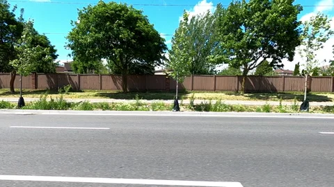 Toronto, Can May 23 2025 Generic POV side view driving plate city suburban Stock Footage 336745219