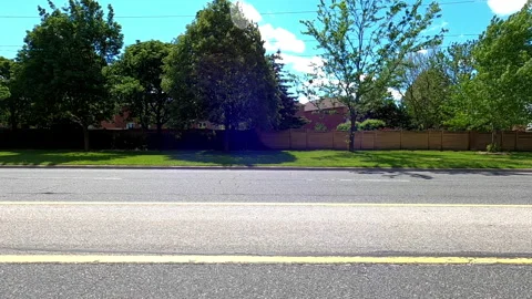 Toronto, Can May 23 2025 Generic POV side view driving plate city suburban Stock Footage 336745376