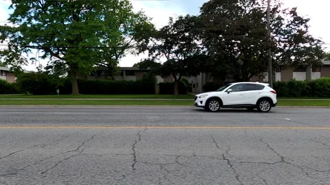 Toronto, Can May 23 2025 Generic POV side view driving plate city suburban Stock Footage 336746975