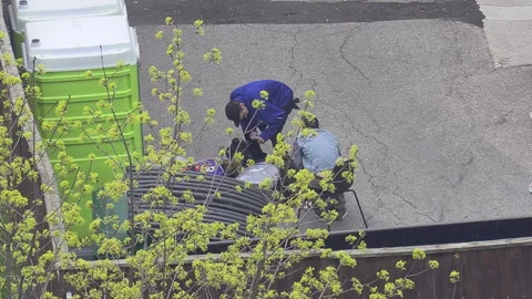 Toronto, Can,  May 5 2026  Fentanyl fold Drug use behind homeless shelter Stock Footage 334139089