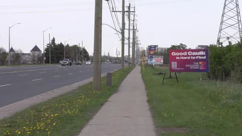 Toronto, Can,  May 5 2026  Controversial adverting billboard sign Stock Footage 335257455
