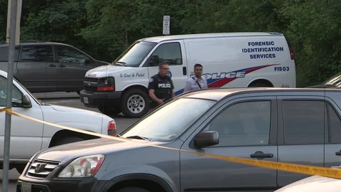 Toronto, Can,  May 5 2026  Police officers at a crime scene shooting in city Stock Footage 340916905