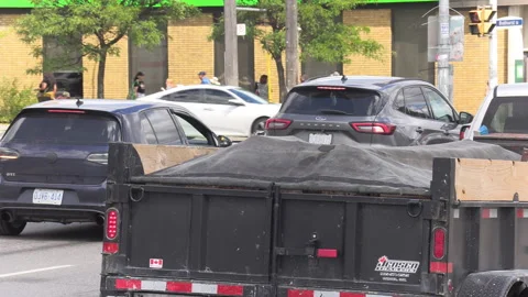 Toronto, Can Sep 8 2026 Busy city intersection with cars and people Stock Footage 344883568