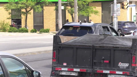 Toronto, Can Sep 8 2026 Busy city intersection with cars and people Stock Footage 344883576