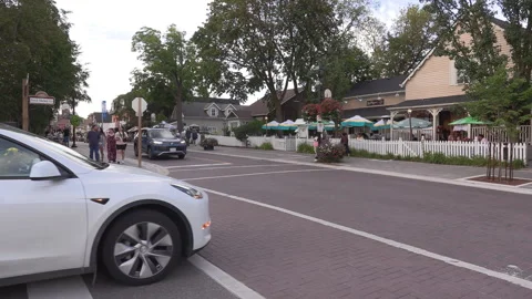 Toronto, Can Sep 8 2026 Busy city intersection with cars and people Stock Footage 344983842