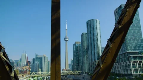 Toronto, Canada – 2018/10/09: The CN Tower revealed through bridge Stock-Footage 328370716