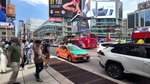 TORONTO, CANADA - 2024 August 4 : busy yonge street at Dundas square Video stock 280943045