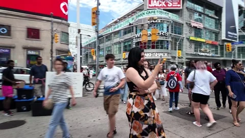 TORONTO, CANADA - 2024 August 4 :   walking through the crowd Video stock 280943111