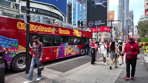 TORONTO, CANADA - 2024 August 4 : city sightseeing bus stop at Dundas square Stock Footage 280943161