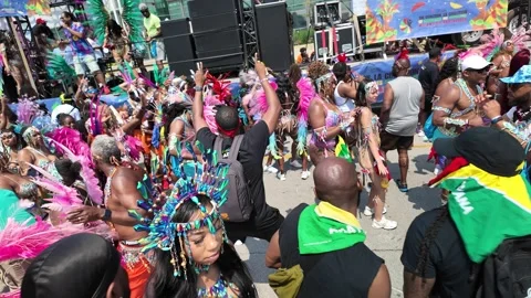 Toronto, Canada 2025 August 2: Caribbean Carnival street dancing Stock Footage 314200970