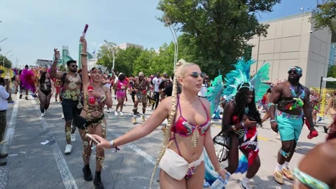 Toronto, Canada 2025 August 2: Participants of Caribbean Carnival parade Video stock 314200972