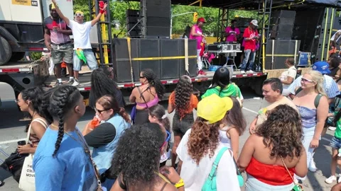 Toronto, Canada 2025 August 2: performers on the  large truck Stock Footage 314200979