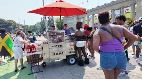 Toronto, Canada 2025 August 2: Hotdog stand in front of CNE entrance Stock Footage 314200981