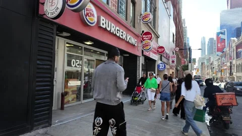 TORONTO, CANADA - 2026 September 5: people passing " Burger King" Stock Footage 344773998