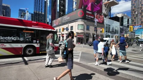 TORONTO, CANADA - 2026 September 5: crossing Younge and Dundas intersection Stock Footage 344774008