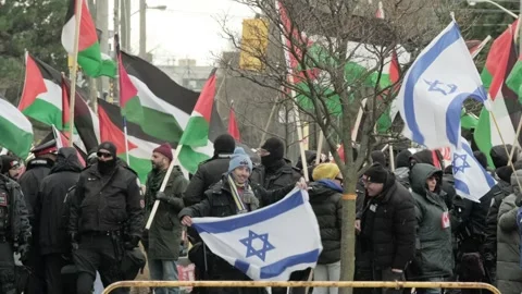 Toronto, Canada - December 1, 2024: Tense Protest between Jews and Palestinians Stock Footage 294998308