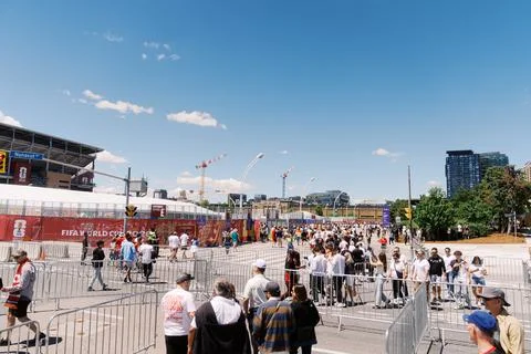 Toronto, Canada - June 20, 2026: Soccer fans crowd outside stadium for FIFA Stock Photos