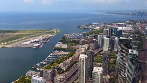Toronto, Canada - June 9, 2026: Aerial perspective of Toronto's waterfront show Stock Footage 342318795