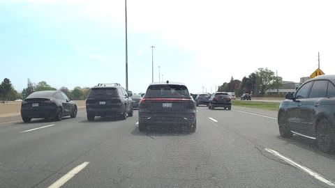 Toronto. Canada, May 23 2026 POV extreme highway traffic Stock Footage 335330802