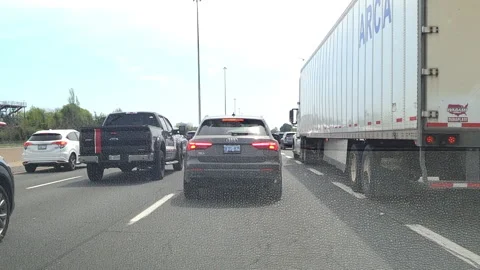 Toronto. Canada, May 23 2026 POV extreme highway traffic Stock Footage 335330922