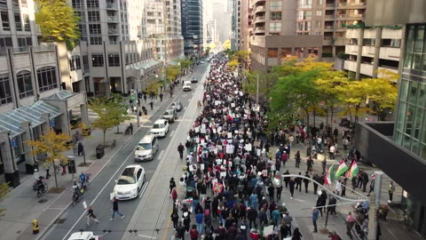 Toronto, Canada - Oct 22nd '22 - Stunning aerial view of protest for Iran Video stock 219758581