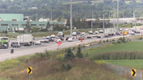 Toronto, Canada, Sep 8 2026 Rush hour traffic gridlock on highway 401 Видео 345149436