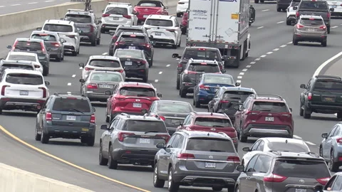Toronto, Canada, Sep 8 2026 Rush hour traffic gridlock on highway 401 Видео 345150257