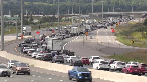 Toronto, Canada, Sep 8 2026 Rush hour traffic gridlock on highway 401 Видео 345150698