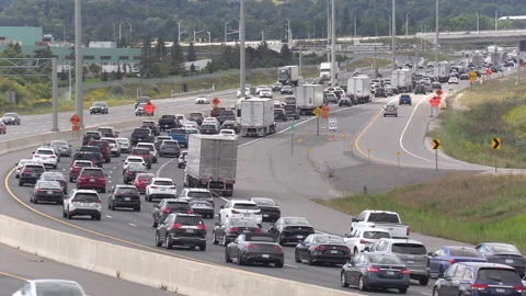 Toronto, Canada, Sep 8 2026 Traffic jam gridlock on highway 401 Видео 345151287