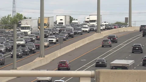 Toronto, Canada, Sep 8 2026 Traffic jam gridlock on highway 401 Видео 345151992