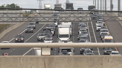 Toronto, Canada, Sep 8 2026 Traffic jam gridlock on highway 401 Видео 345152368