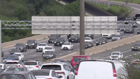 Toronto, Canada, Sep 8 2026 Rush hour traffic gridlock on highway 401 Видео 345154191