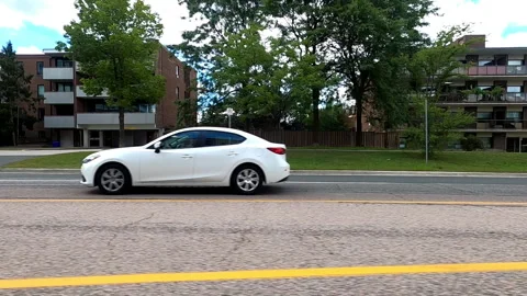 Toronto, Canada Sept 8 2026 POV side view driving plate city urban area Stock Footage 345689475
