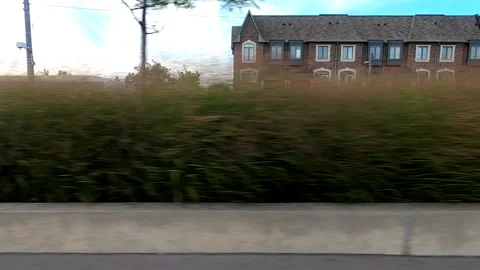 Toronto, Canada Sept 8 2026 POV side view driving plate city urban area Stock Footage 345690018