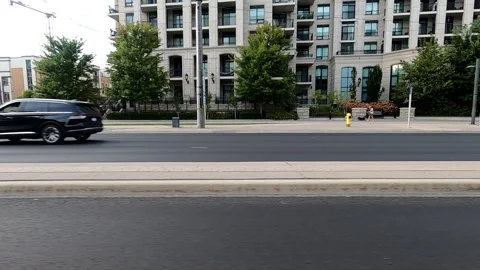 Toronto, Canada Sept 8 2026 POV side view driving plate city urban area Stock Footage 345690047
