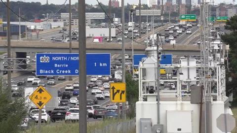 Toronto, Canada September 8 2026 Air quality station beside busy highway traffic Stock Footage 345153431