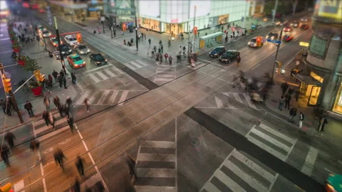 Toronto, Canada, Timelapse of Traffic and Pedestrians Crossing Busy Intersection Stock Footage
