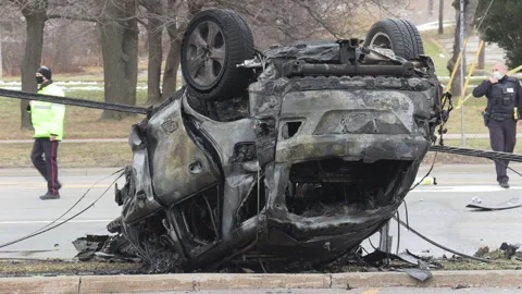 Toronto car accident in city intersection with police and fire on scene 動画素材 146072806