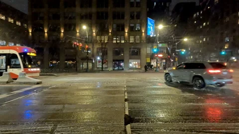 Toronto City Intersection during Wet Snow Storm Stock Footage 261782923