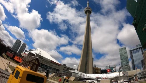 Toronto CN Tower Rogers Centre and Trains in Roundhouse ParkTime Lapse Stock Footage 106217533