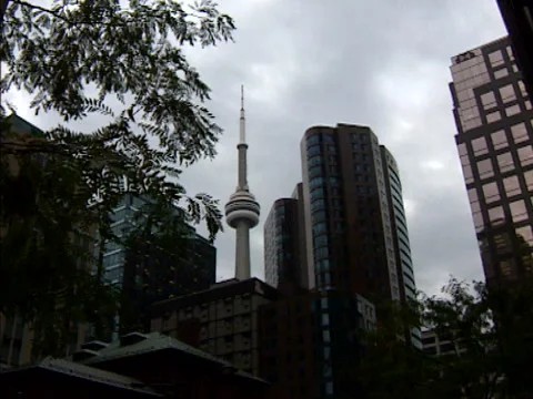 Toronto The CN Tower stands out among the buildings Stock Footage 142016078
