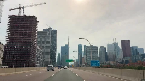Toronto downtown skyline seen from a moving vehicle on the Gardiner Expressway. Stock Footage 343674792