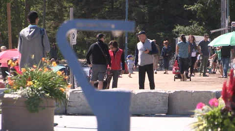 Toronto eastern beaches crowded boardwalk on sunny day Stock Footage