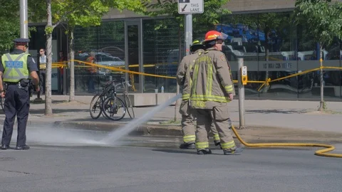 Toronto Emergency Crime Scene Intersection Firemen Spraying Water Hose Cleani Stock-Footage 91015122