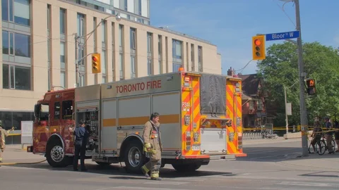 Toronto Emergency Crime Scene Intersection Firetruck Bloor Sign Intersection Video stock 91015200